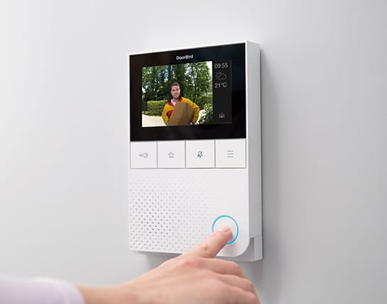 DoorBird A1101 in white showing the door-open screen