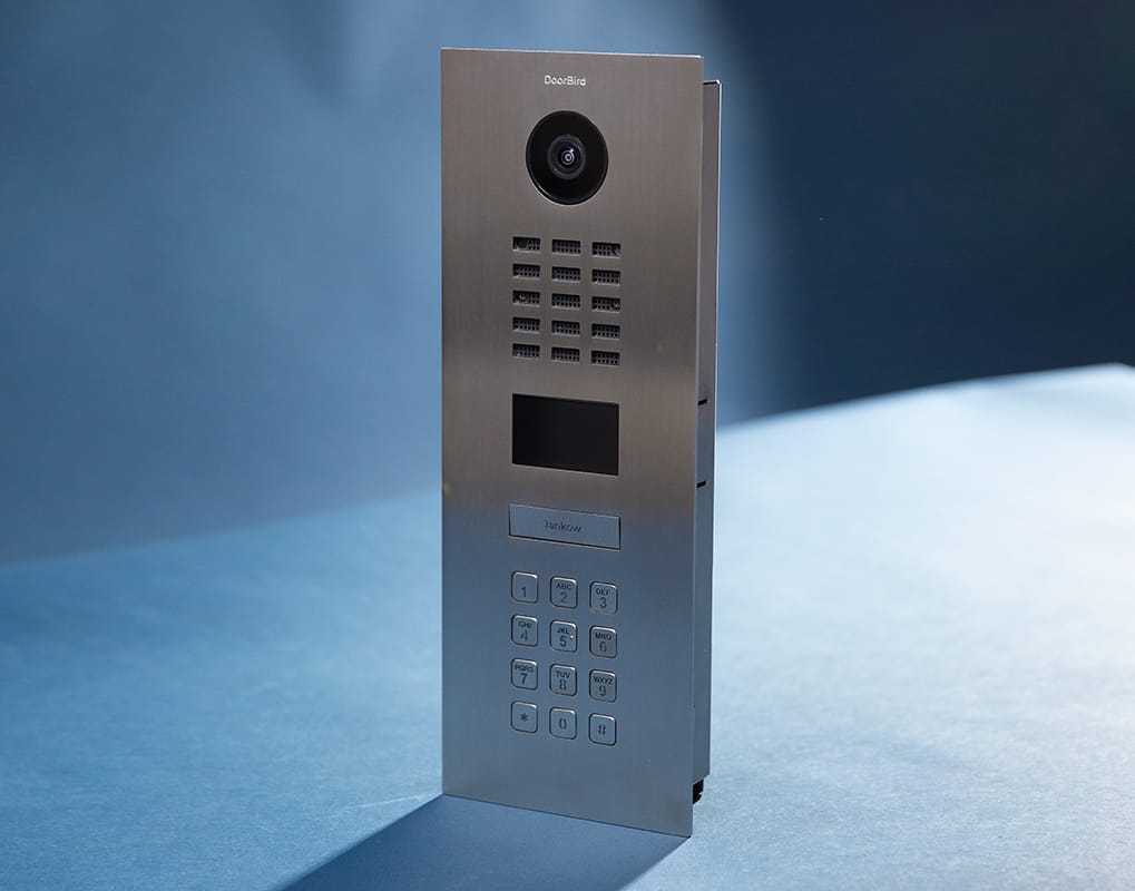DoorBird D2101KV, three-quarter view of the brushed stainless front