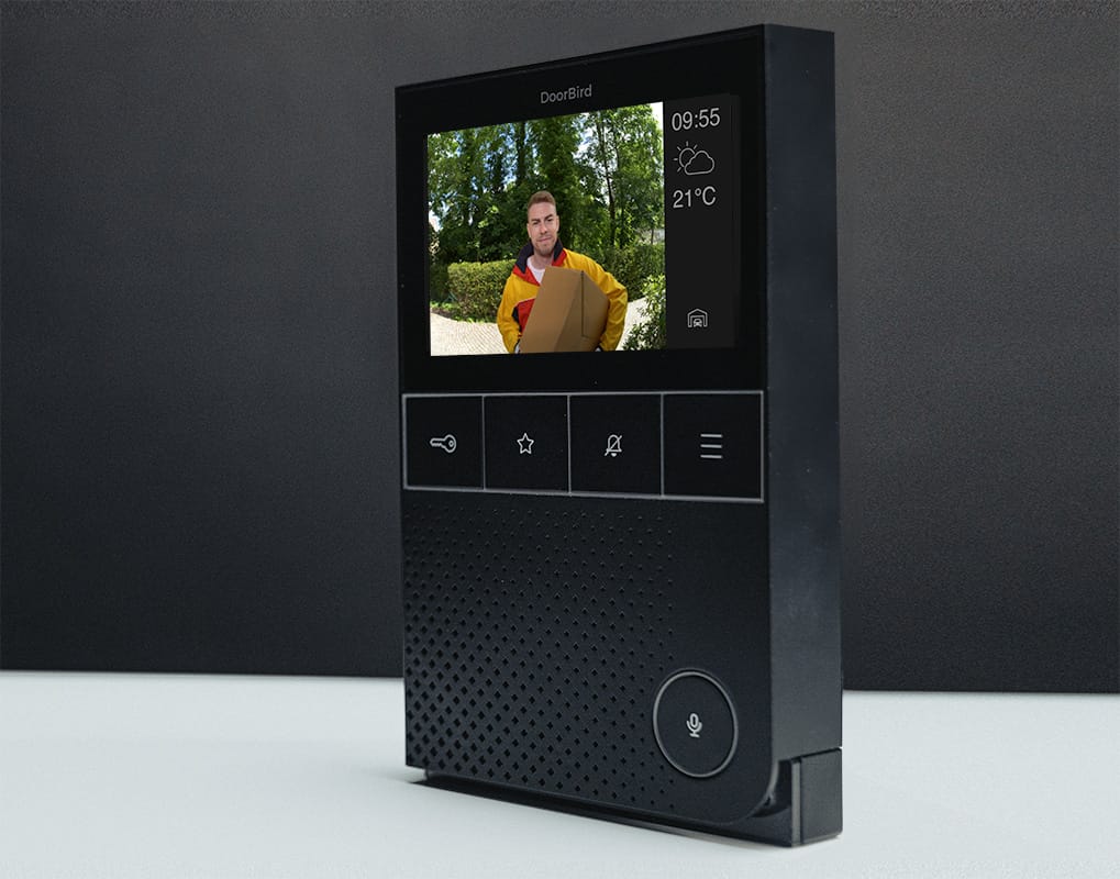DoorBird A1101 in black showing a live video call from the door station
