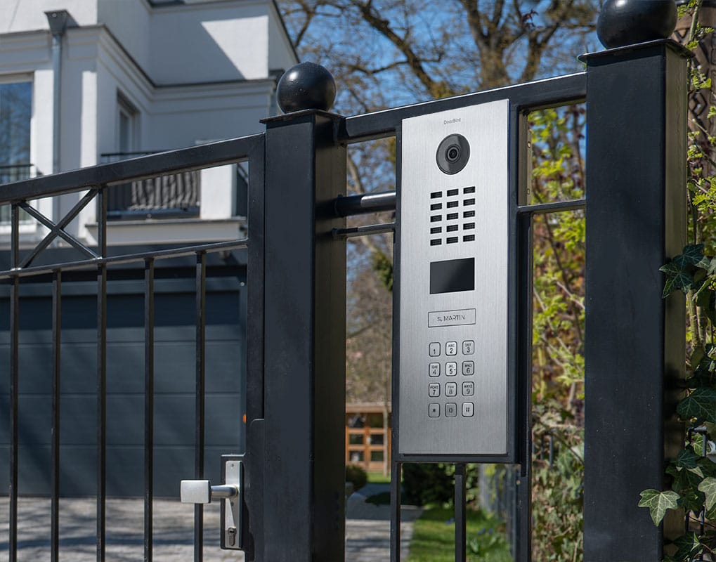DoorBird D2101KV installed on a gate post