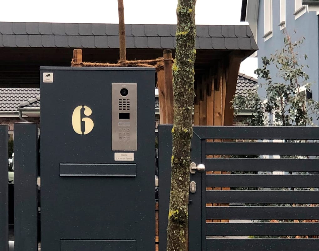 DoorBird D2101KV built into a gate pillar