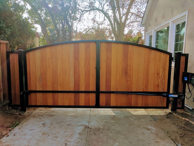Aluminum vs. Steel vs. Wrought Iron Driveway Gates: Which Material Should You Buy? — GateFrames driveway gate guide