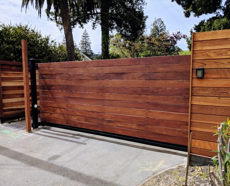Automatic Driveway Gate Safety: UL 325, Entrapment Zones and the Sensors You Must Install — GateFrames driveway gate guide