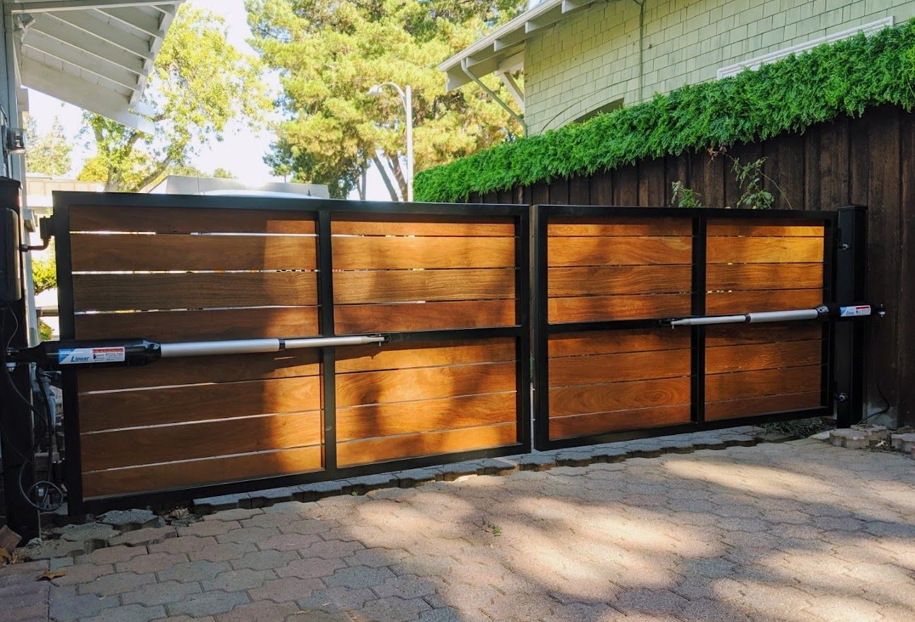 Driveway gate guides
